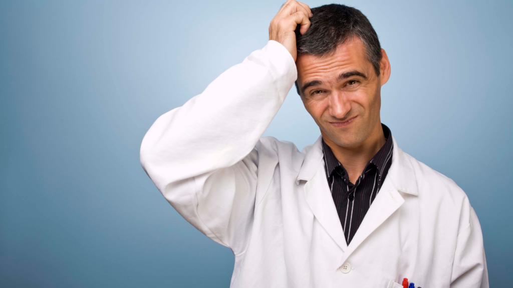Confused doctor scratching his head