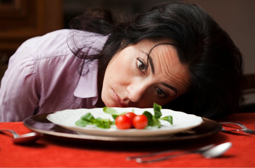 Woman dejected by dieting